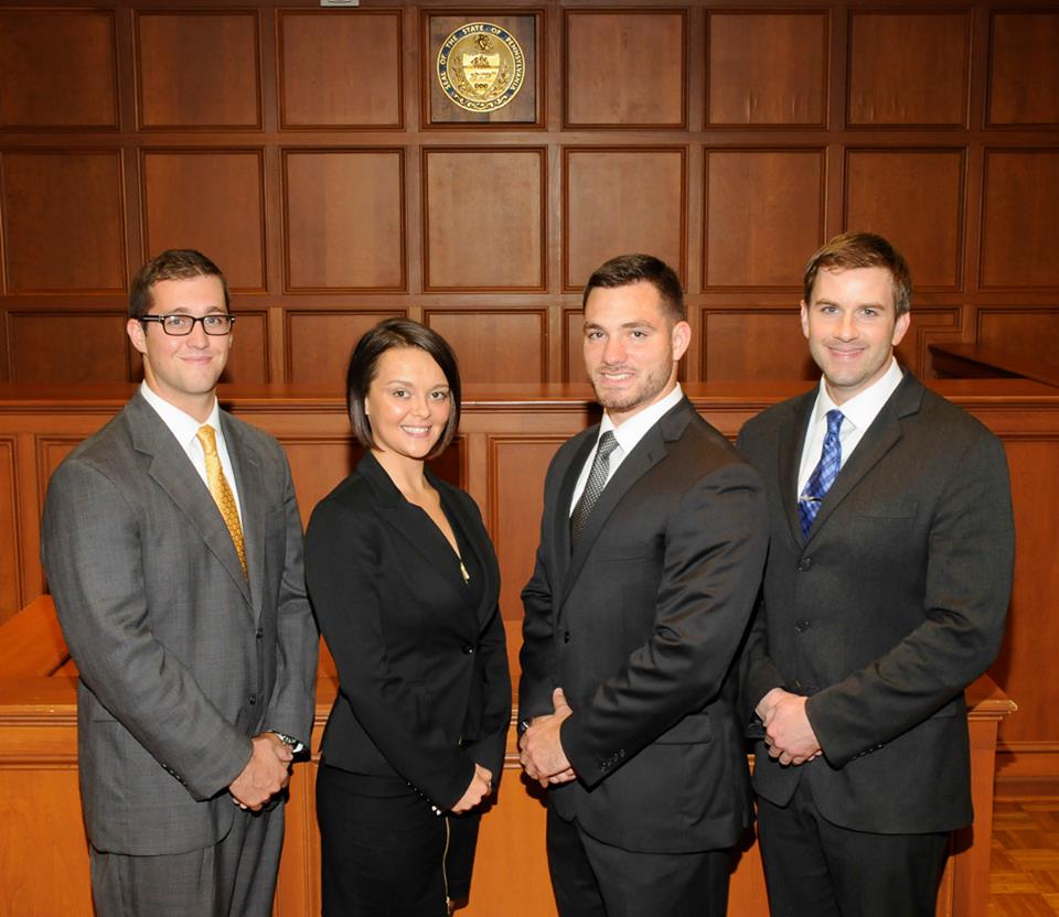 Pictured from Right to Left: 2L Brandon Uram, and 3Ls Kaci Young, Benjamin Trodden and Matthew Capan.